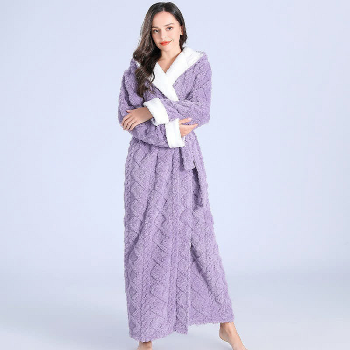 Cozy women's hooded flannel robe, plush and ankle-length. Soft winter sleepwear available in pink, gray, or purple.