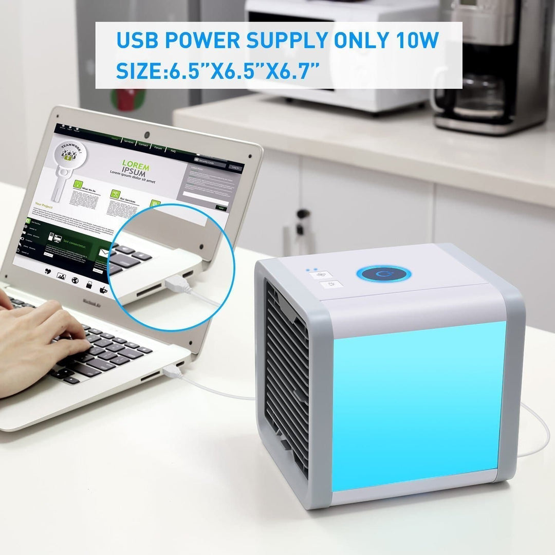 USB-powered portable air cooler & mini humidifier. Enjoy clean, cool air with this personal air purifier & fan.