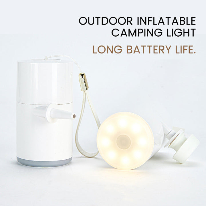 Camping lantern with integrated portable air pump, offering convenient inflation and light.