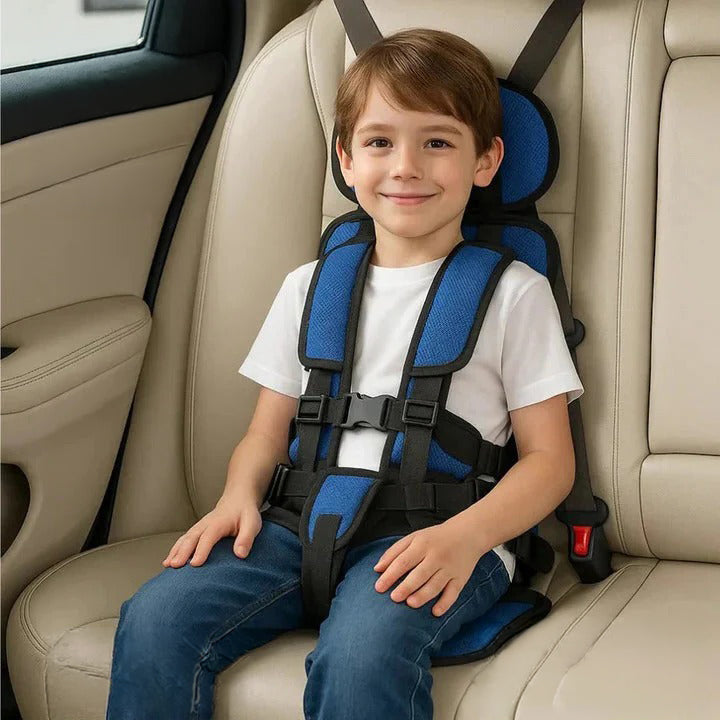 Portable child travel safety seat with 5-point harness for vehicle safety.