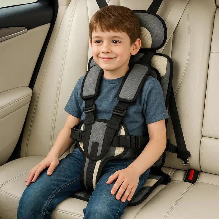 Kids' travel booster seat with a 5-point safety harness, ensuring vehicle safety.