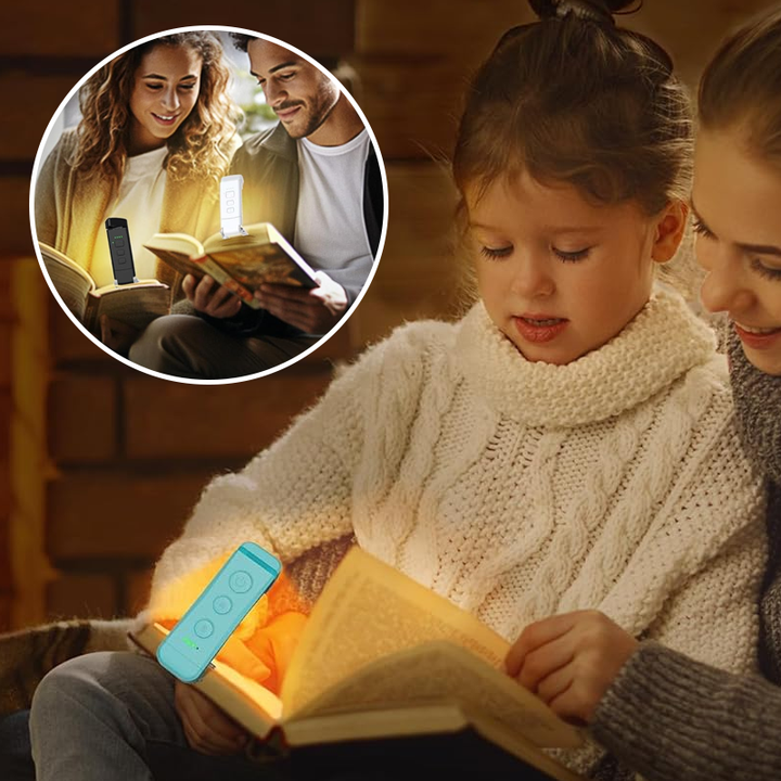 Portable clip-on LED reading light, flexible neck, black finish, illuminating an open book