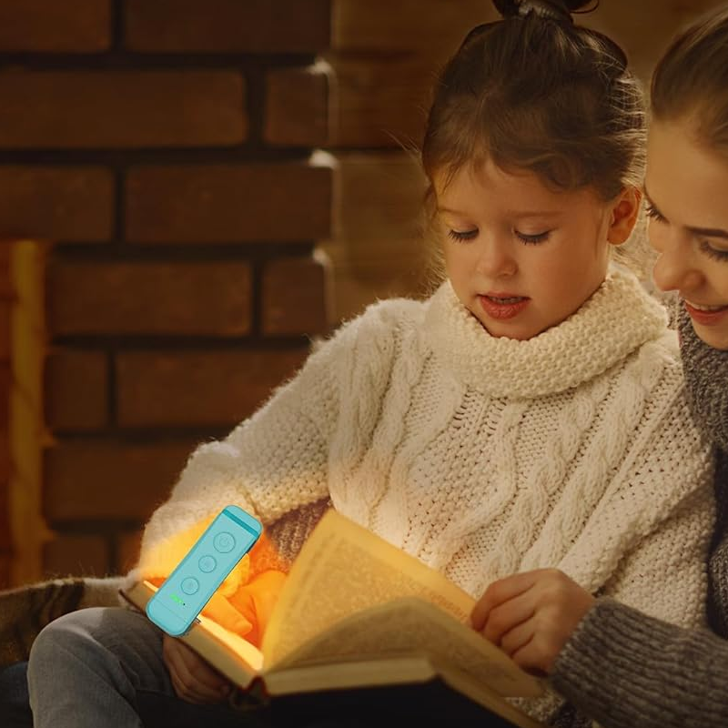 Rechargeable LED reading light with USB charging port, perfect for travel and on-the-go use