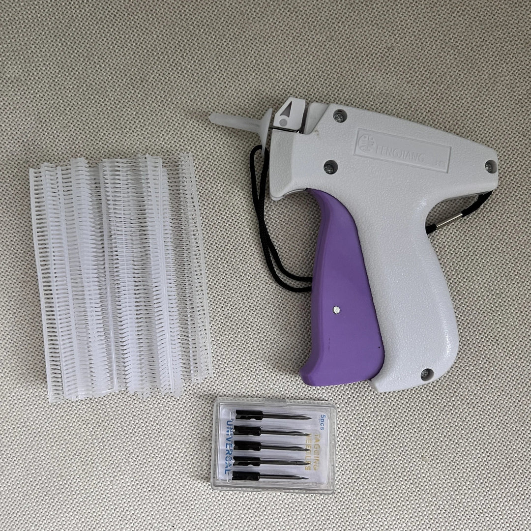 Illustrative image of the clothing fixer creating a temporary hem on a pair of trousers