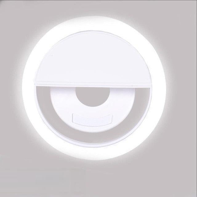 Compact, portable LED selfie ring light for smartphones. Essential content creation tool for bright videos & photos on travel.