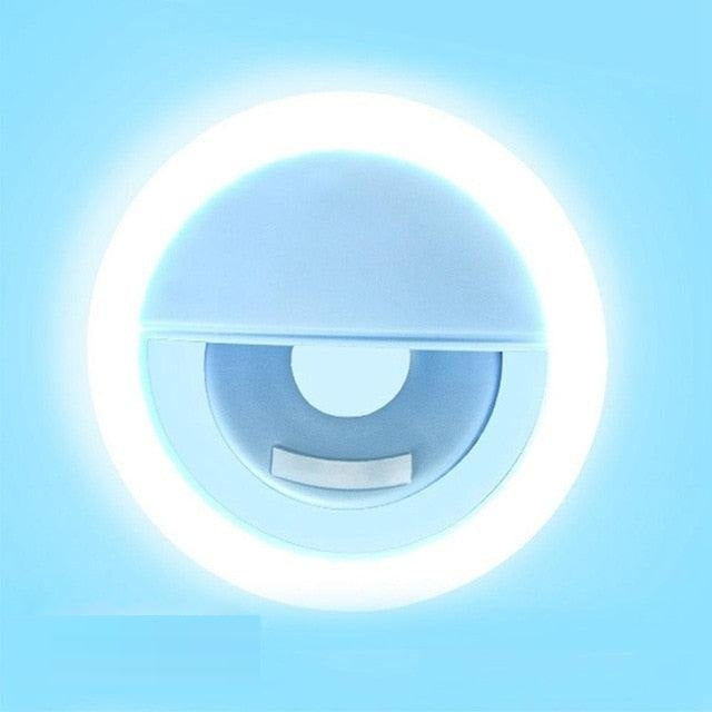 Easy-to-use portable LED selfie ring light. Clips onto smartphones for enhanced lighting on the go, perfect for vloggers.