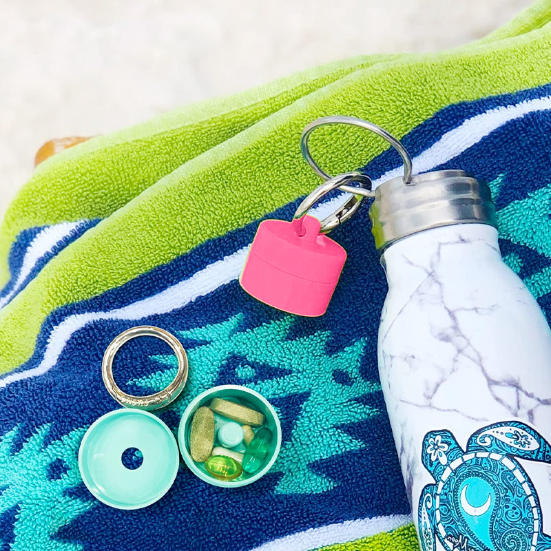 Multipurpose mini storage capsule with keychain, perfect for small items on the go