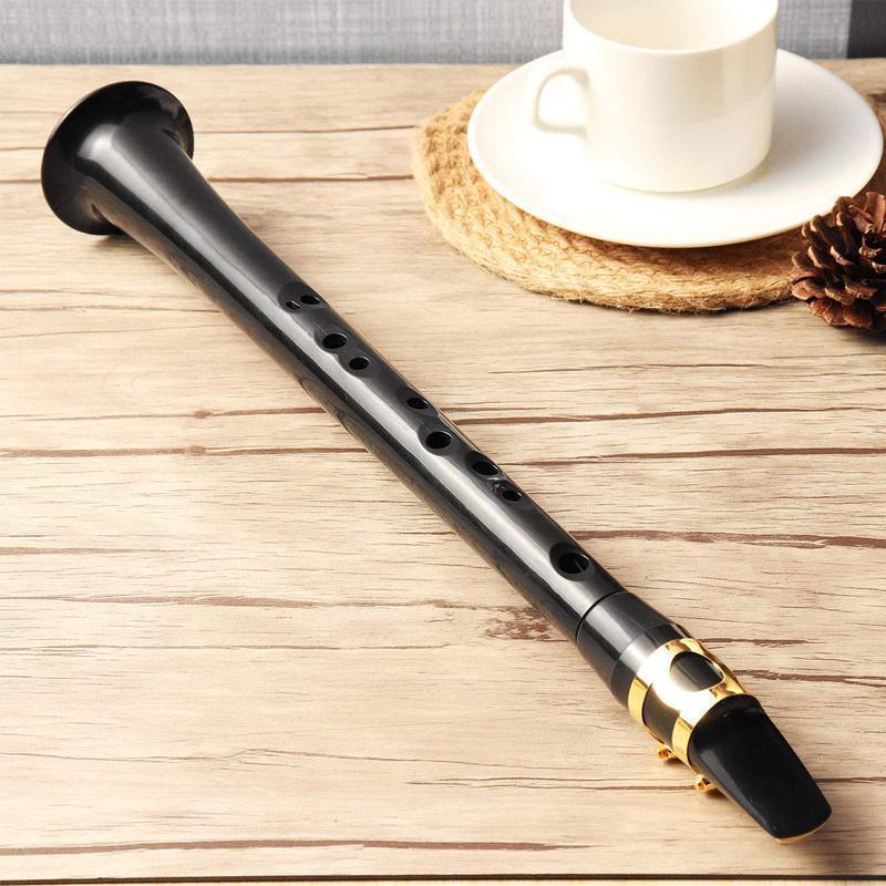 Adult and kids' portable mini saxophone, a compact ABS wind instrument for musical fun.