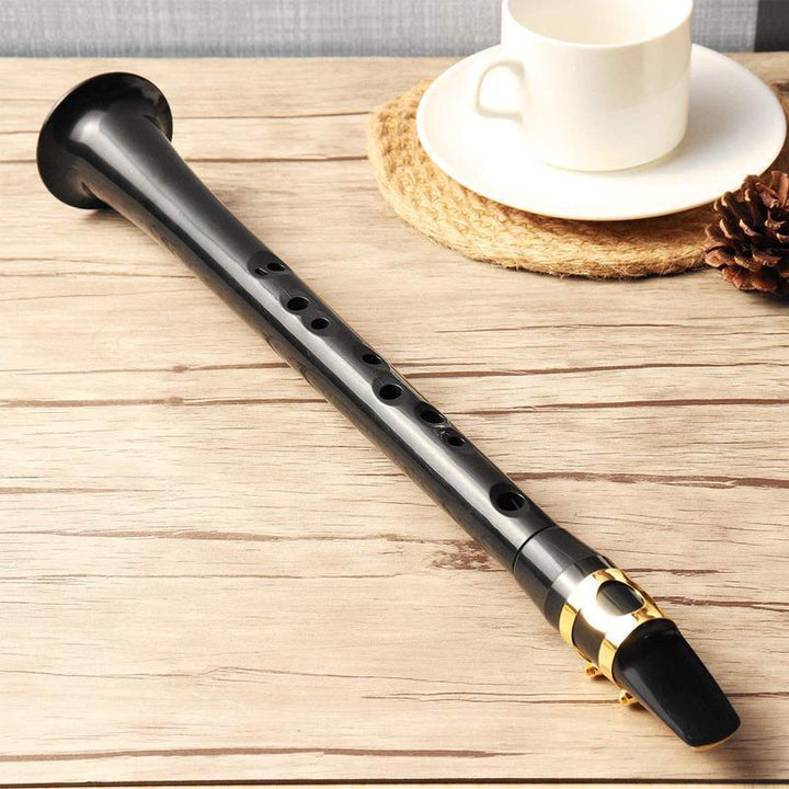 Adult and kids' portable mini saxophone, a compact ABS wind instrument for musical fun.