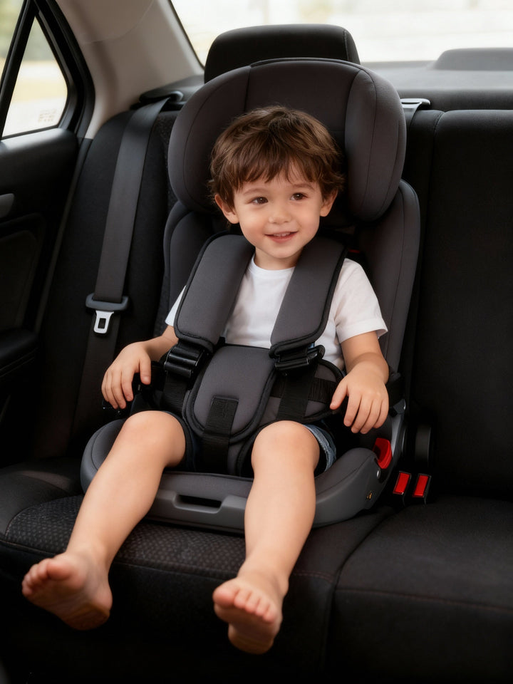 Compact travel booster seat for children, with an easy-to-use adjustable harness system.