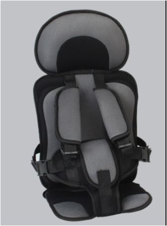 Children's travel booster seat, compact & foldable, with a reliable safety harness for safe journeys.