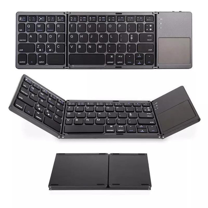 User typing on a portable tri-fold wireless keyboard with touchpad, enhancing mobile efficiency