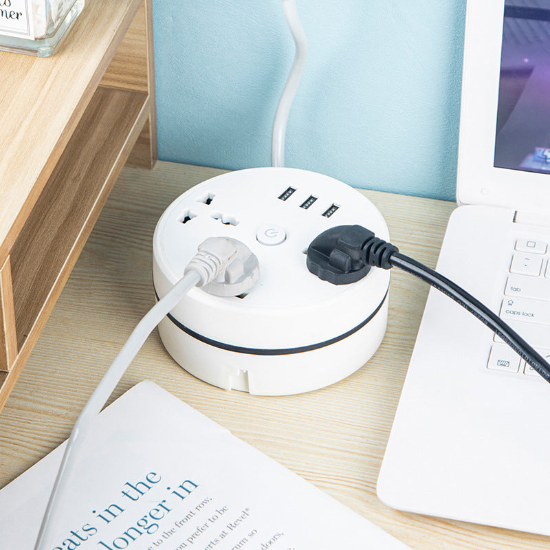Black portable power strip with universal outlets, 3 USB ports, perfect for home or international travel.