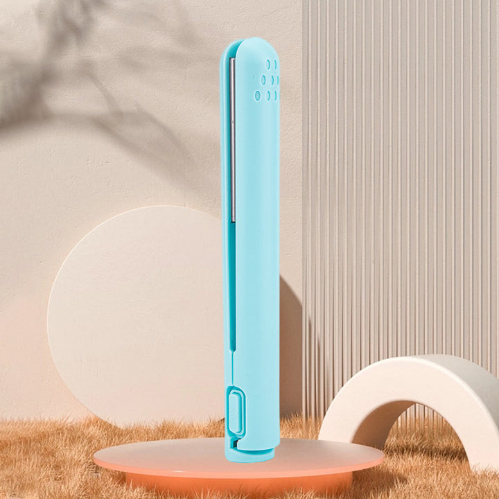 Straightening hair with the portable USB mini hair iron, showing its effectiveness on front strands.