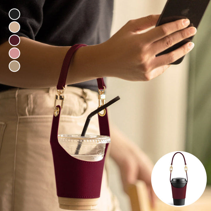 Portable vegan leather cup holder, beige, featuring a sturdy handle for easy transport of drinks