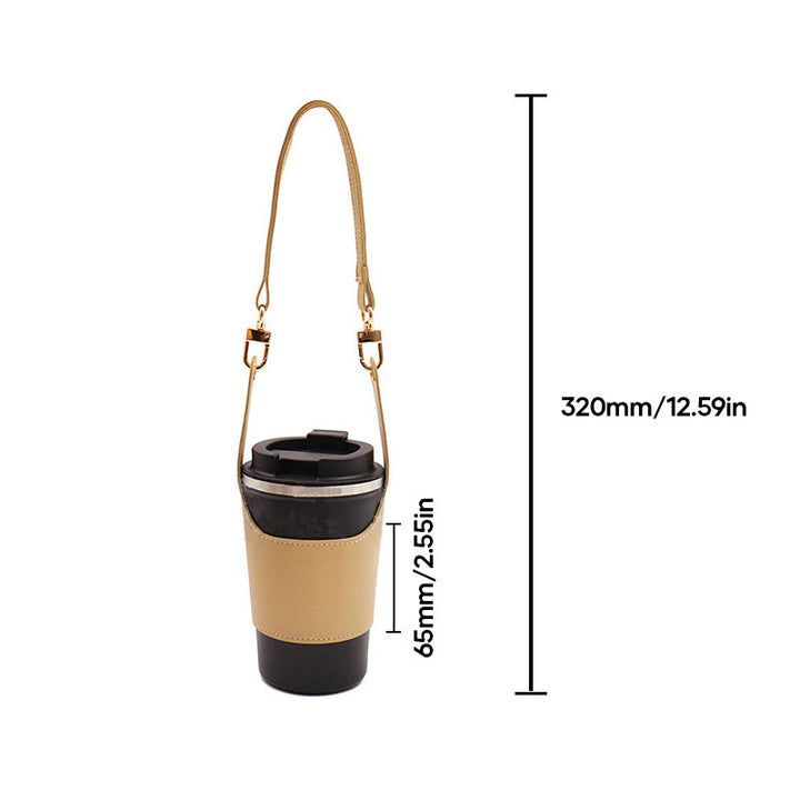Vegan leather travel mug carrier, shown holding a large insulated coffee mug securely
