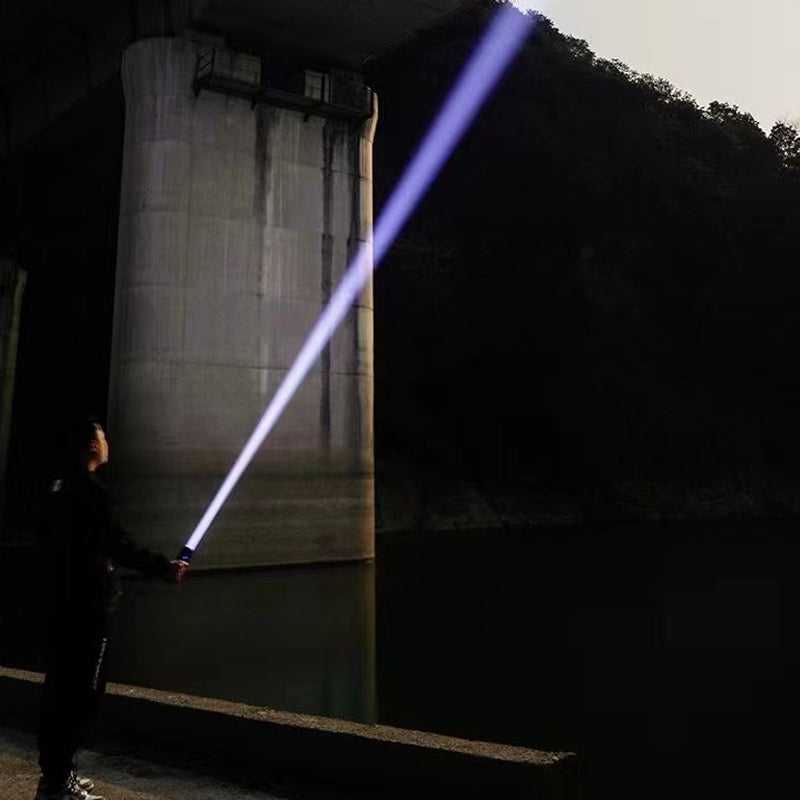 Waterproof rechargeable flashlight, immersed in water, proving durability for harsh outdoor conditions