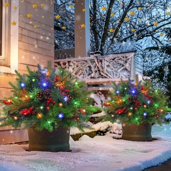 Battery-operated pre-lit LED evergreen urn filler with festive pine cones & berries. Perfect Christmas home decor.
