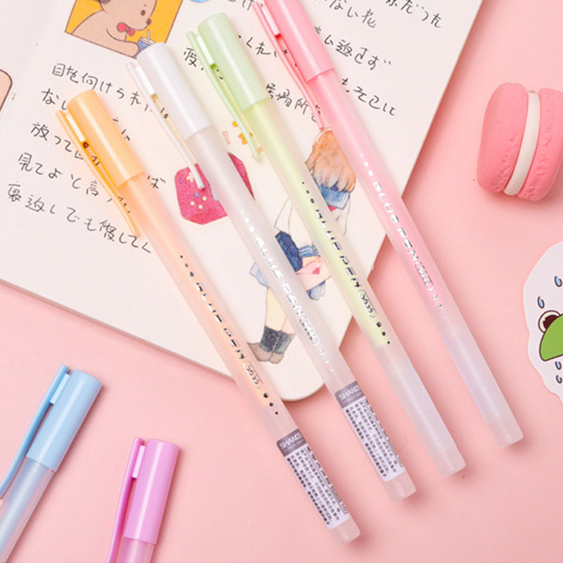 Close-up of Quick Dry Glue Pen tip, showing fine point for precise adhesive application in crafting