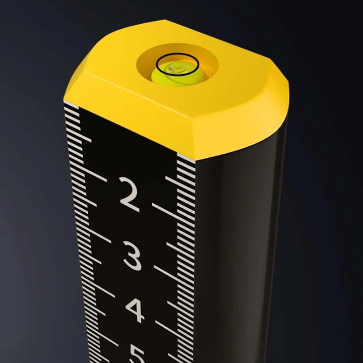 Close-up of a precision magnetic level, showing bubble vials for accurate leveling in construction.