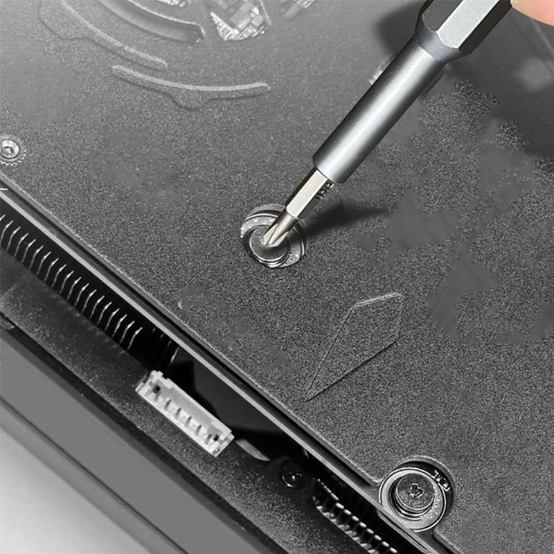 Close-up of magnetic screwdriver bits from a precision set, perfect for intricate tech repair tasks.