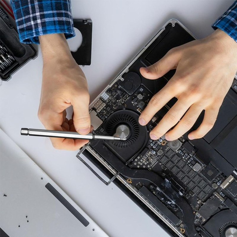 Magnetic screwdriver set open, displaying various bits and tools for phone and laptop repair.