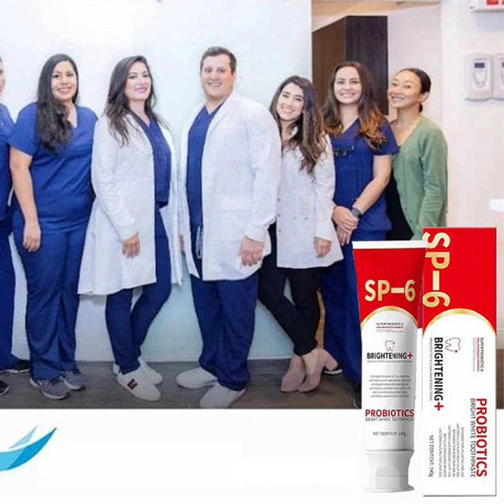 Probiotic toothpaste with whitening agents, shown next to a sonic toothbrush for dental health.