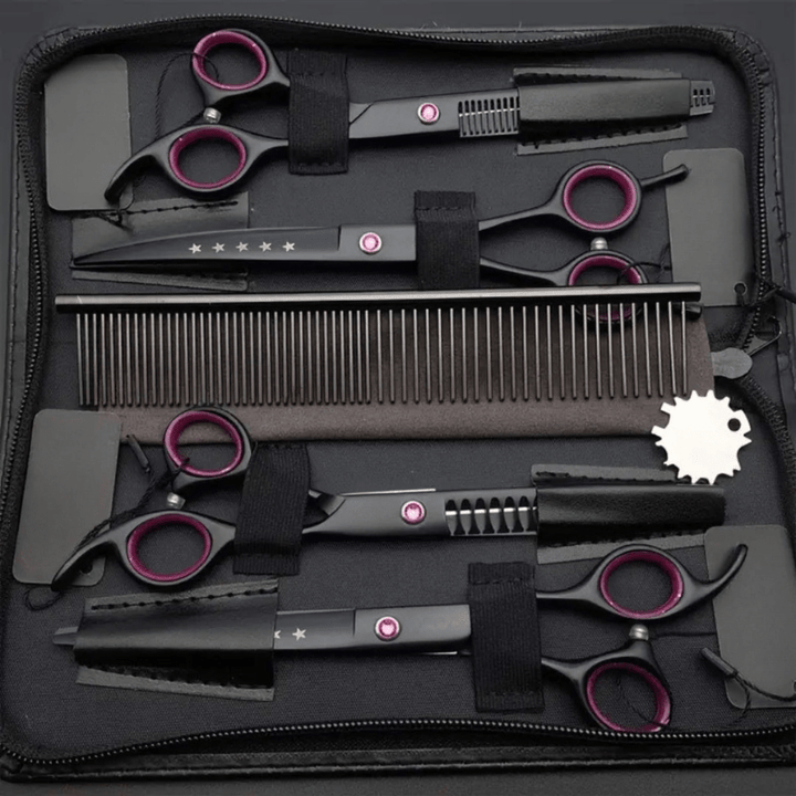 Professional dog & cat grooming scissor set. Includes straight, curved & thinning shears for precise pet coat care.