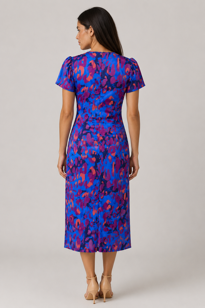 Elegant women's V-neck midi dress featuring puff sleeves and a flattering gathered waist.