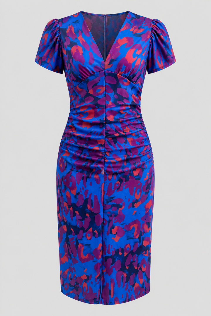 Fashionable women's midi dress with a gathered waist, puff sleeves, and a colorful abstract design.