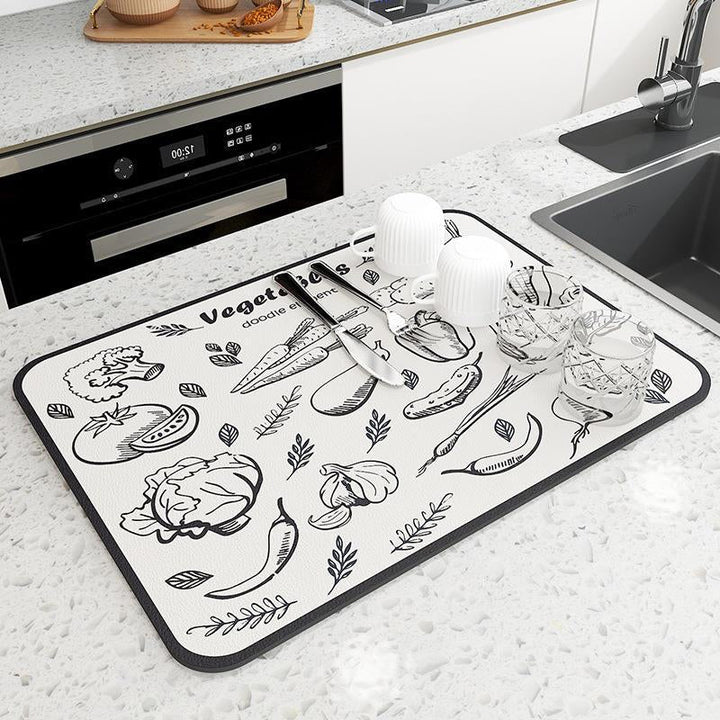 Durable quick-dry diatomaceous earth mat, an essential kitchen accessory and counter protector.