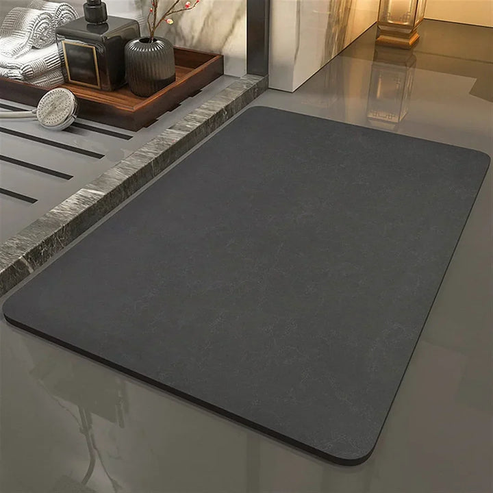 Modern quick dry diatomite bath mat, sleek and absorbent, enhancing bathroom decor with a safe, anti-slip design.