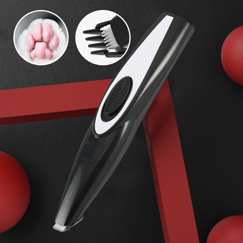 Pet clipper in action on a cat's paw, demonstrating its quiet and efficient use