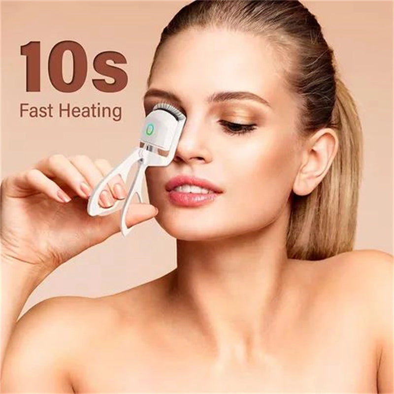 Close-up of heated eyelash curler, showcasing ergonomic design for safe and effective lash curling