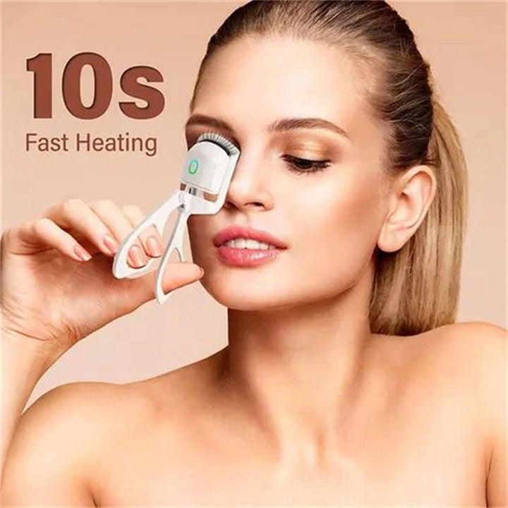 Close-up of heated eyelash curler, showcasing ergonomic design for safe and effective lash curling