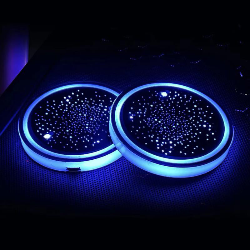 Car interior at night with glowing LED Cup Holder Coasters, stylish auto accessory