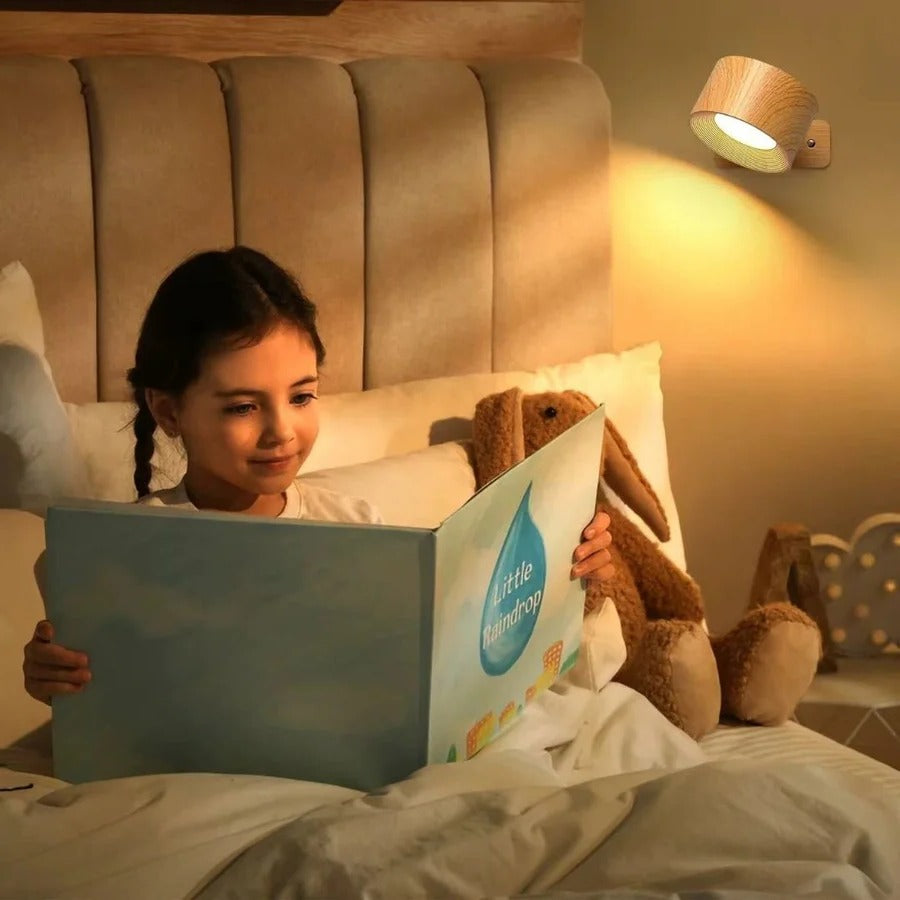 Modern wireless wall light with magnetic mount, rechargeable for easy placement.