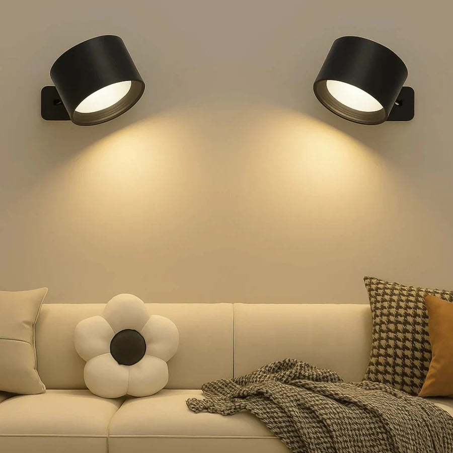 Cordless LED wall lamp, magnetically adjustable for reading or ambient light.