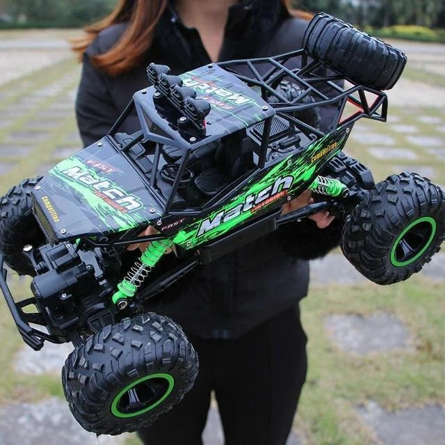 Durable remote control 4x4 off-road RC truck tackling a muddy puddle, perfect for all-terrain adventure.
