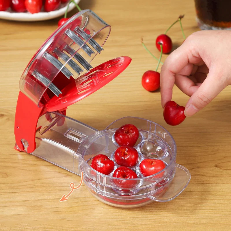 Compact red fruit pitter gadget, ideal for preparing cherries quickly and cleanly.