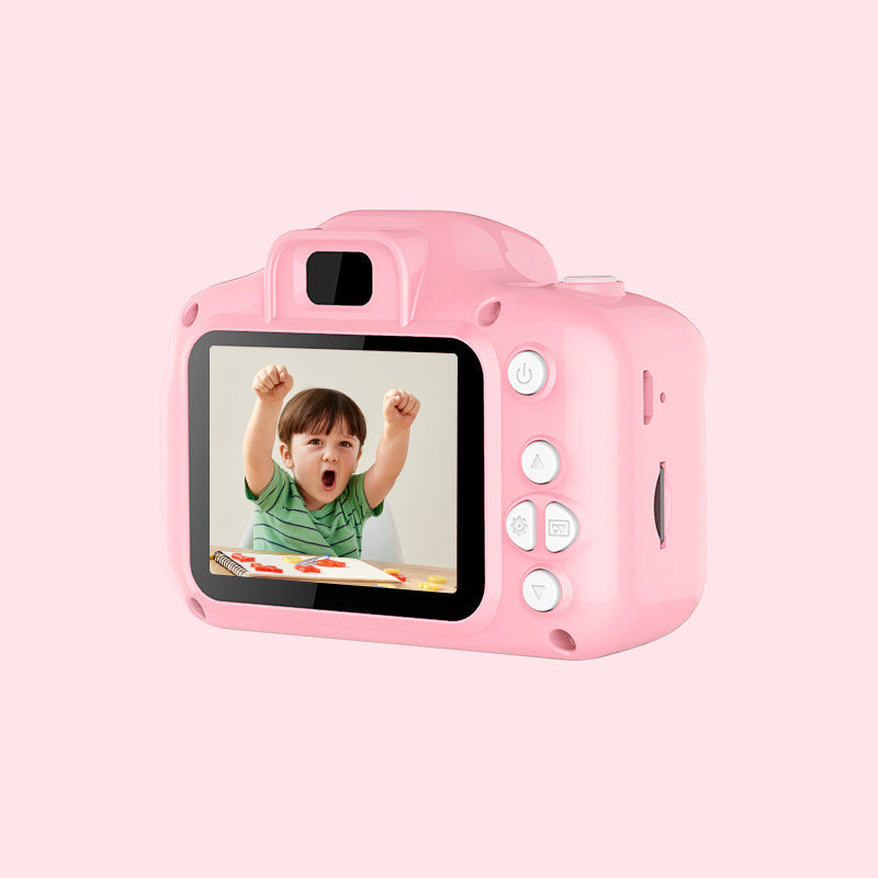 Back view of a pink kids' digital camera, showing its small LCD screen and simple navigation.