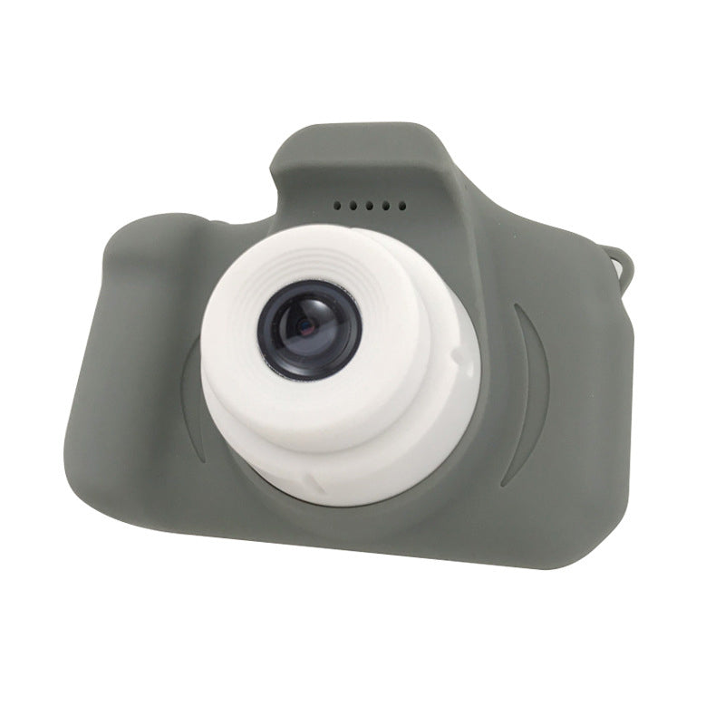 Children sharing a yellow reusable mini digital camera, highlighting its social and interactive aspect.