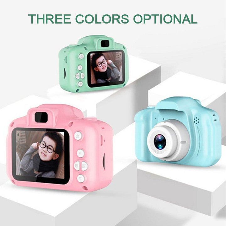Close-up of a kids' reusable mini digital camera, highlighting the screen and control buttons.