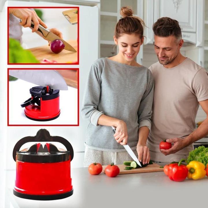 Green kitchen knife sharpener tool, compact and portable with a secure suction base