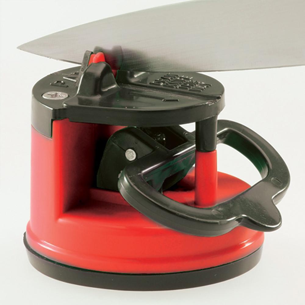 Green kitchen knife sharpener with ergonomic design and non-slip suction base