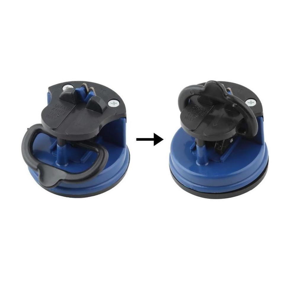 Blue portable knife sharpening tool for kitchen, attaches securely with a suction base