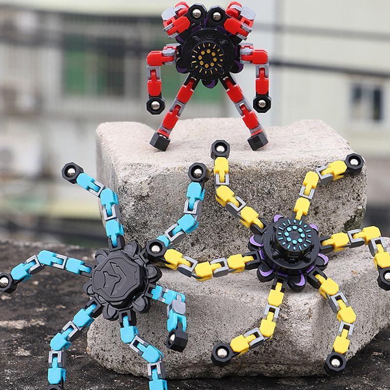 Display of multiple robot fidget spinners in various colors, showcasing their stackable quality