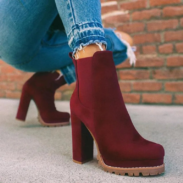 Fashionable leopard print women's block heel boots, profile view, comfortable footwear