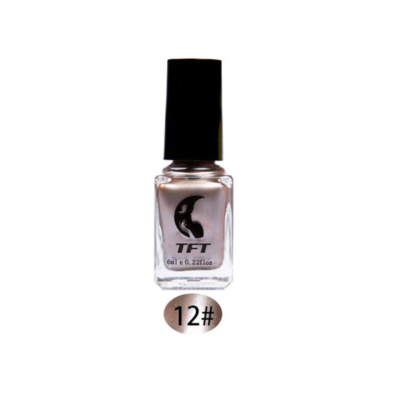 Shiny metallic nail polish, perfect for a glamorous mirror effect manicure