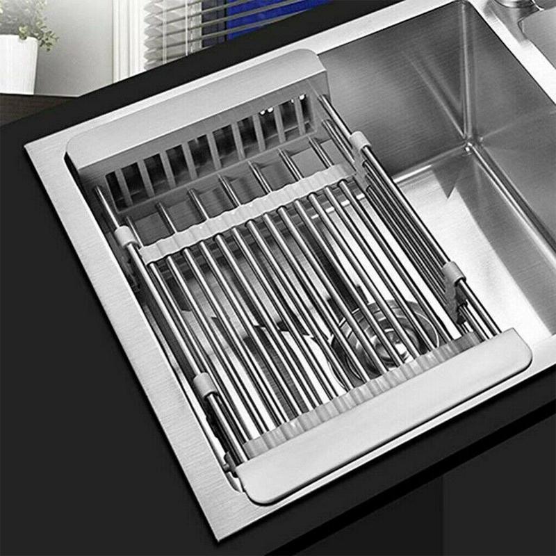 Stainless steel retractable dish drying rack over kitchen sink, ideal for fruits and vegetables
